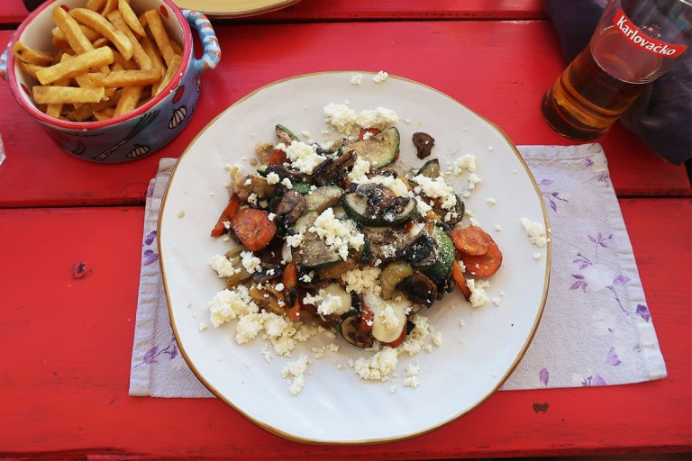 feta-zucchini-dish-with-fries-and-croatian-beer
