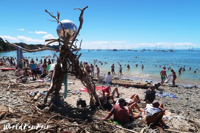 Disco ball sitting atop driftwood beach teepee