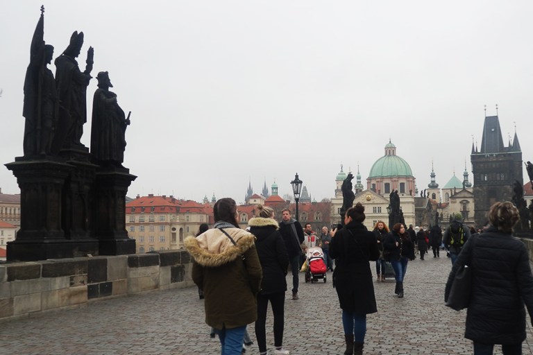 Topdeck tour group crossing Charles Bridge