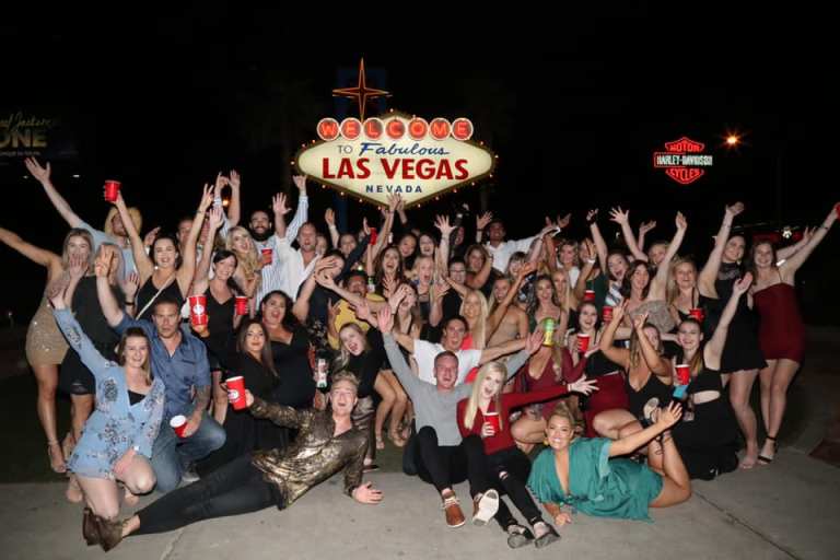 Topdeck group photo at Las Vegas sign